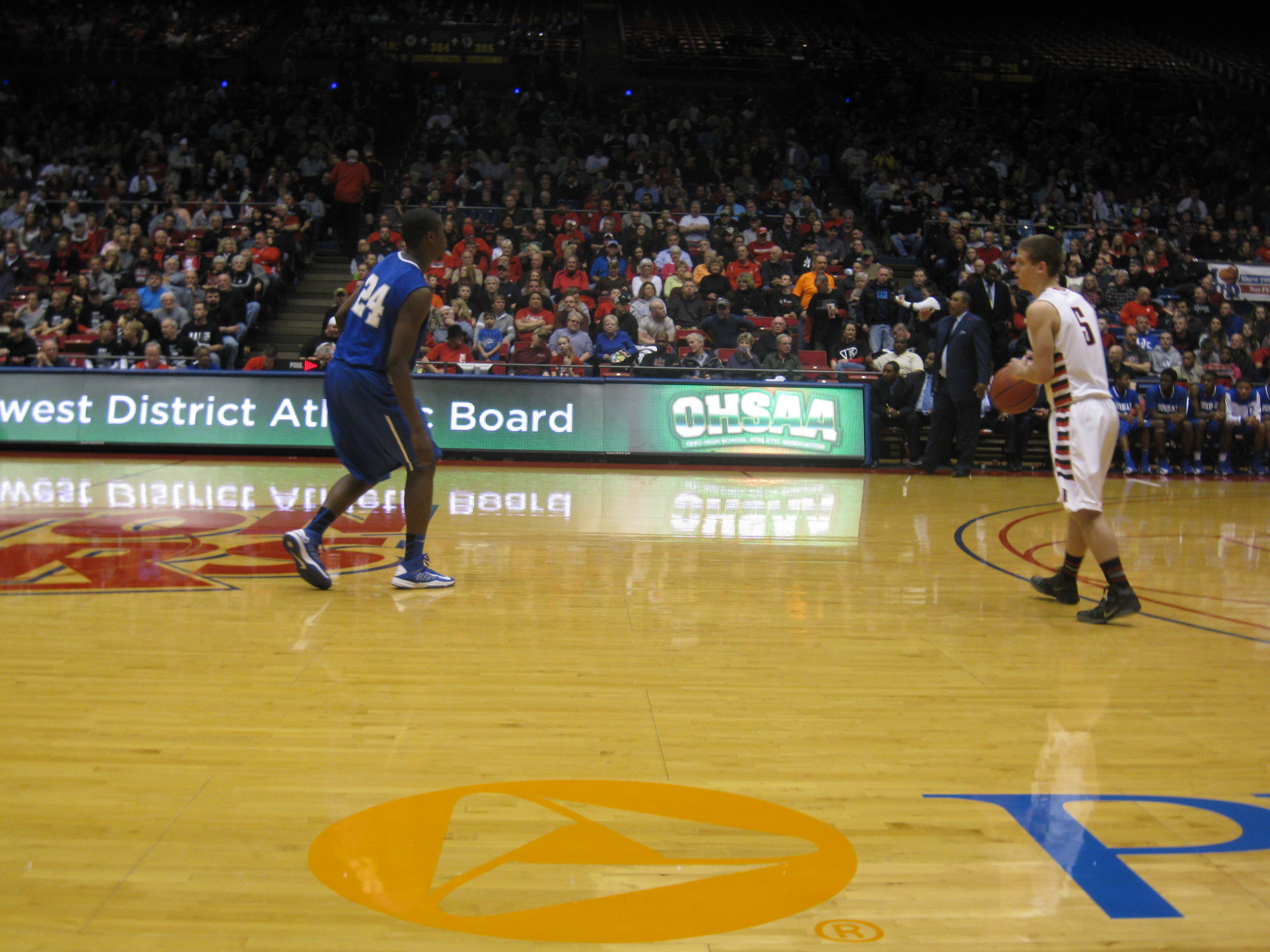 Franklin's Connor Stickelman brings the ball up the floor during a 66-63 loss to Dayton Dunbar Thursday night in the Division II sectional finals at the University of Dayton Arena.